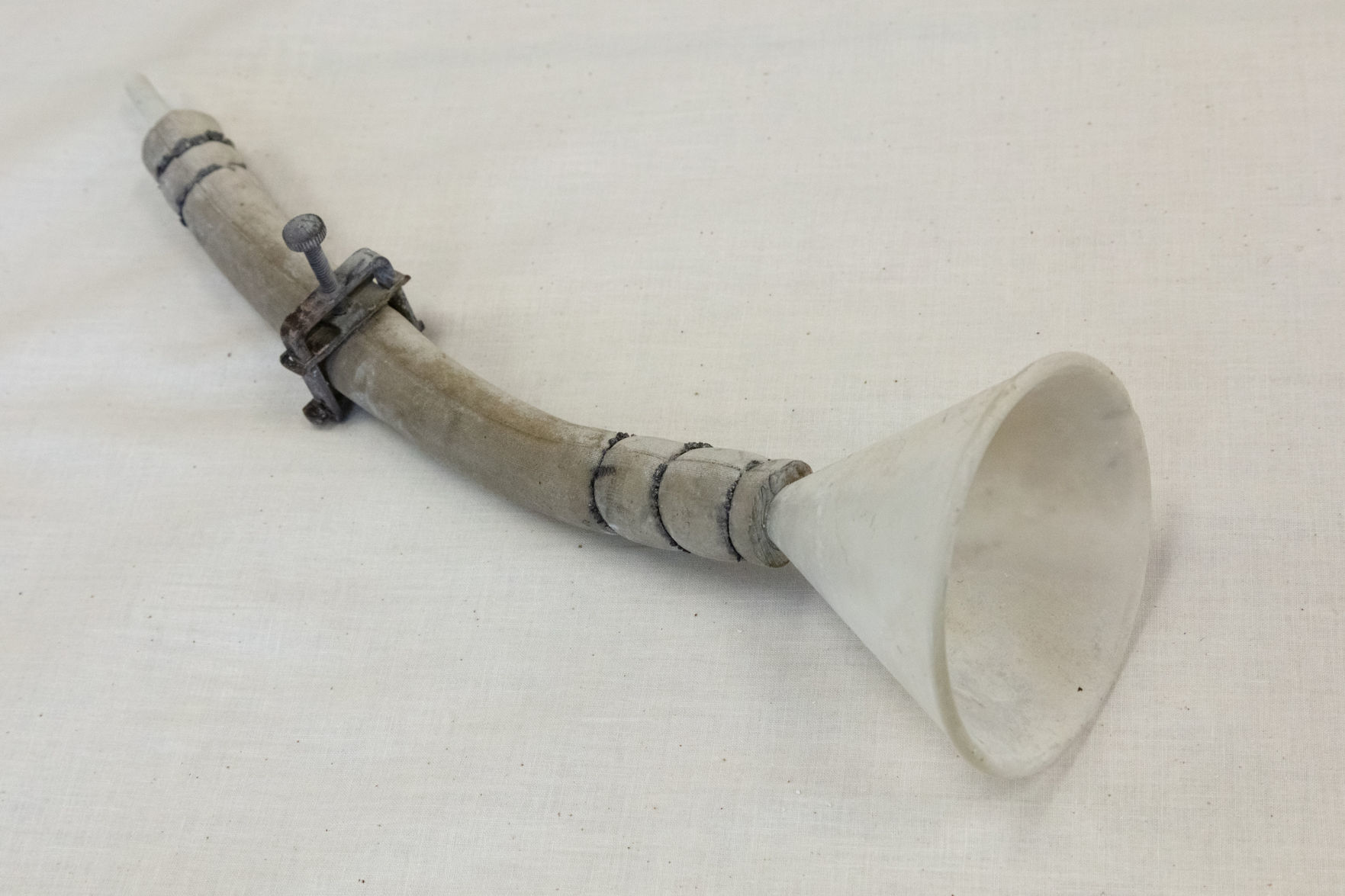 Science equipment: glass funnel and tube with rubber hose